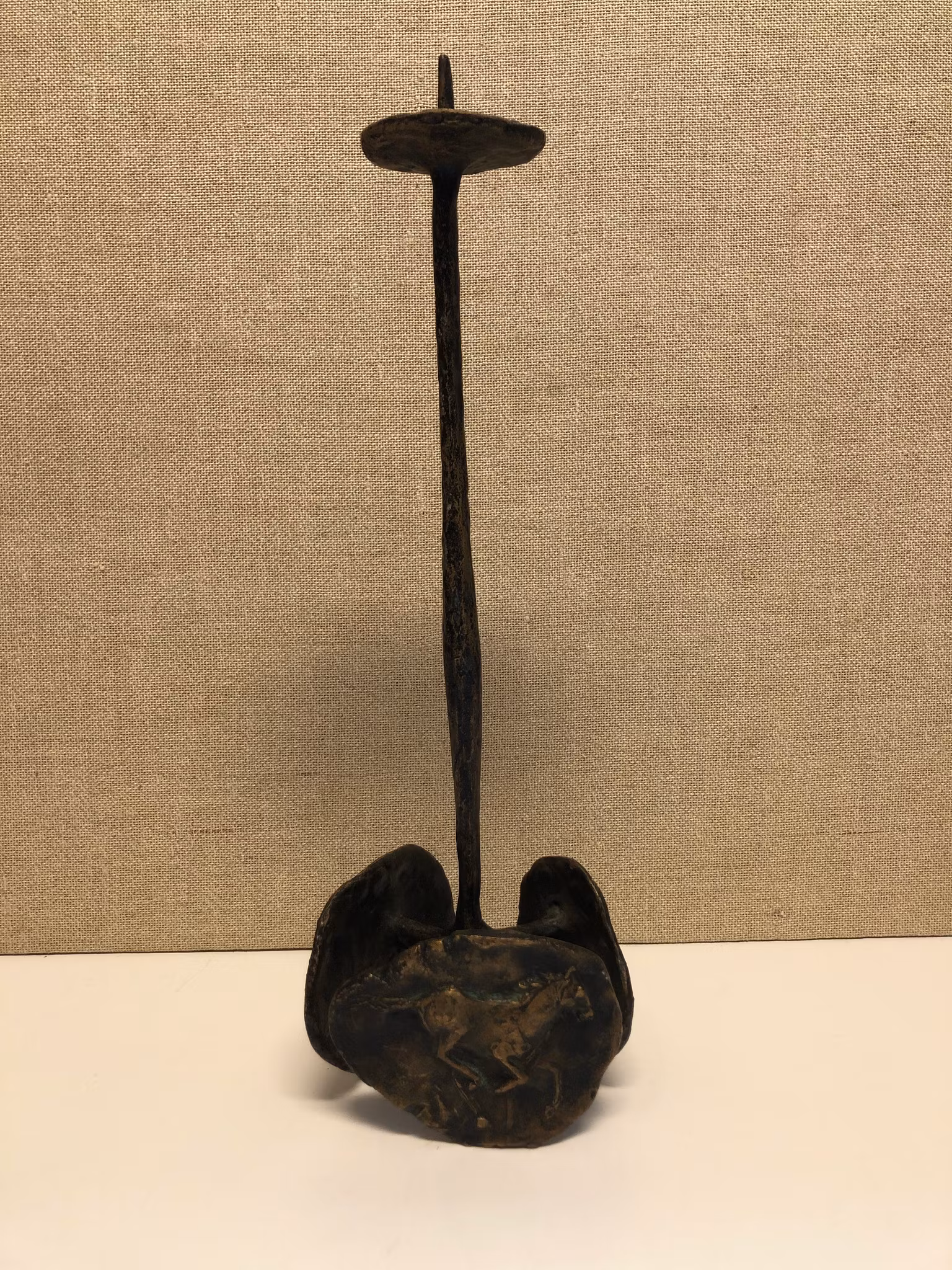 LJUSSTAKE, brons, 1900-talets andra hälft.