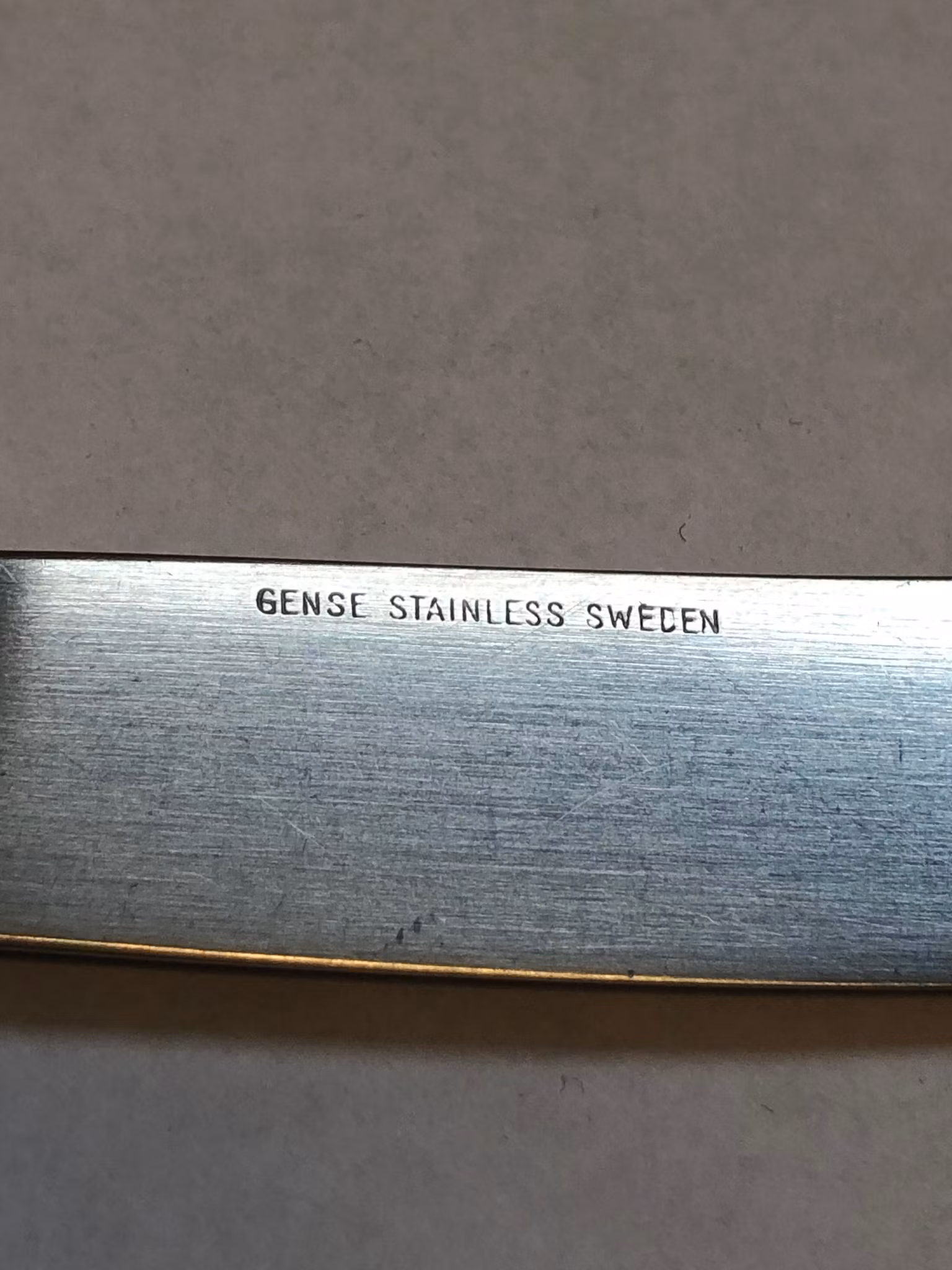 FOLKE AHRSTRÖM. Smörkniv, rostfritt stål, " Thebe", Gense, Sweden.