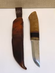 KNIFE, birch/steel/leather, monogrammed SHL and Blade by Ingemar Norell.