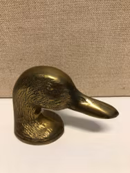BOTTLE OPENER, brass, "Ducky model", second half of the 20th century.