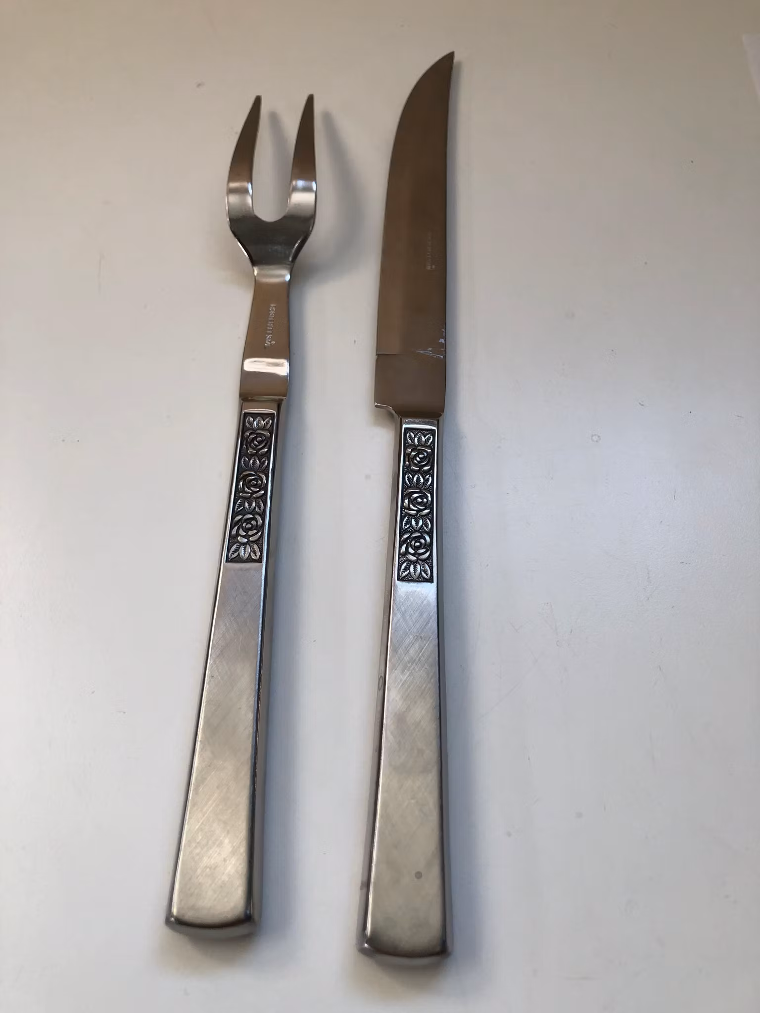 TRANCHERBESTICK, rostfritt stål, "Rosen", Åhlens, 1960/70-tal.