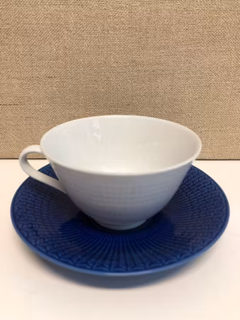 LOUISE ADELBORG. Teacup with saucer, porcelain, "Blue National", Rörstrand.
