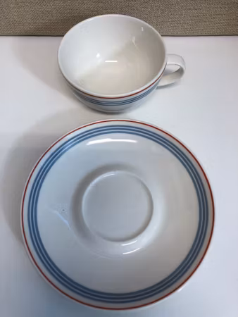 TOVE SLOTTE. Teacup with saucer, porcelain, "Domino Bistro", Arabia, Finland, 1980s/90s.