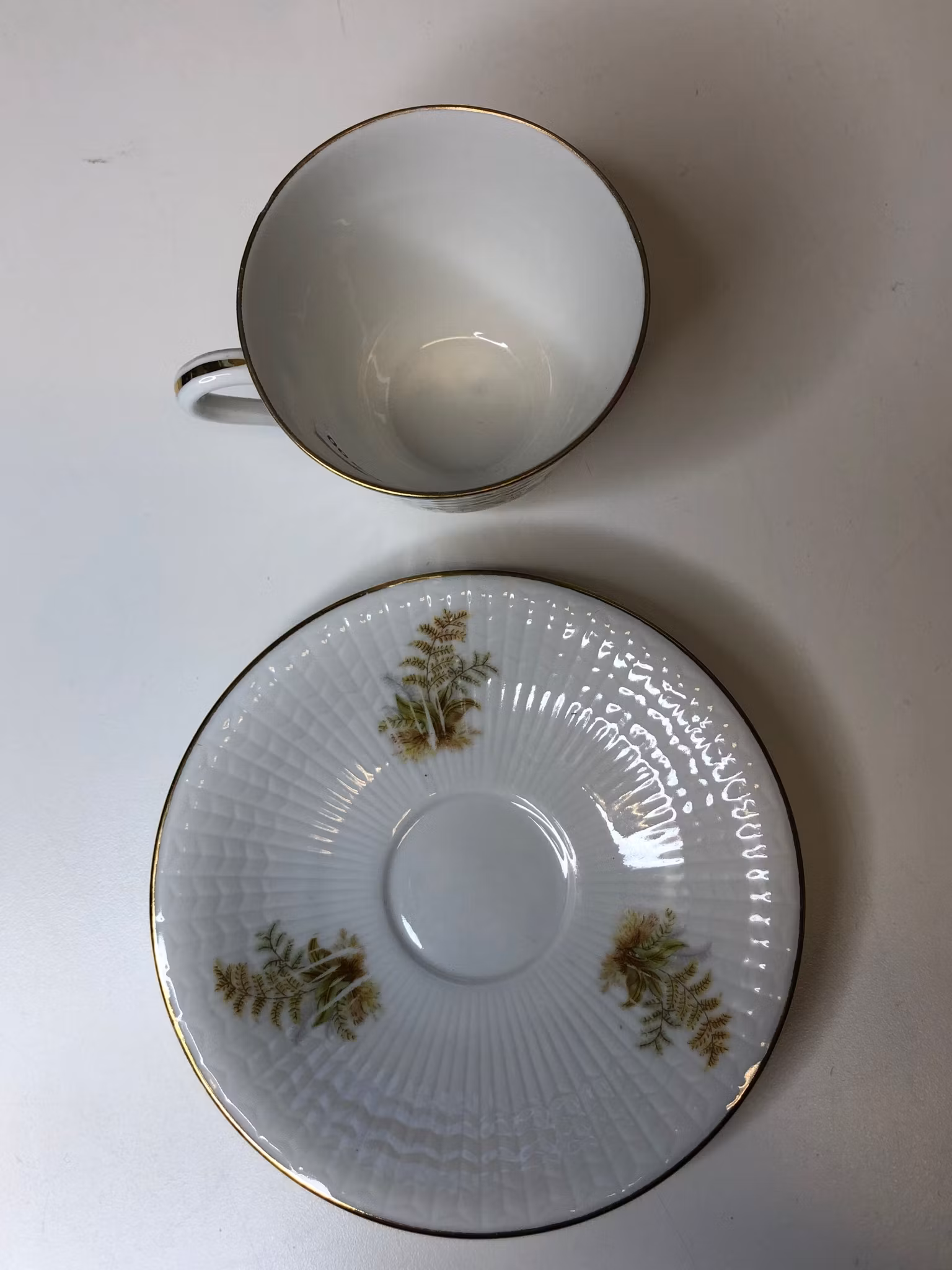LOUISE ADELBORG. Kaffekopp med fat, flintgods, "Lummer", Rörstrand.