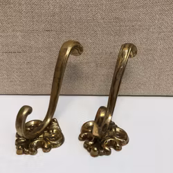 CLOTHES HOOKS 2 pcs. brass, late 20th century.