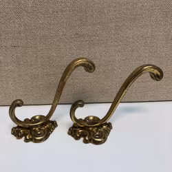 CLOTHES HOOKS 2 pcs. brass, late 20th century.