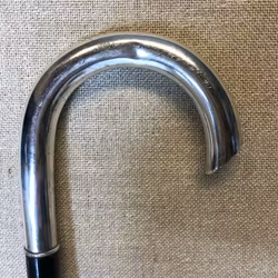 CANE, silver crutch, blackened wood, 1919.