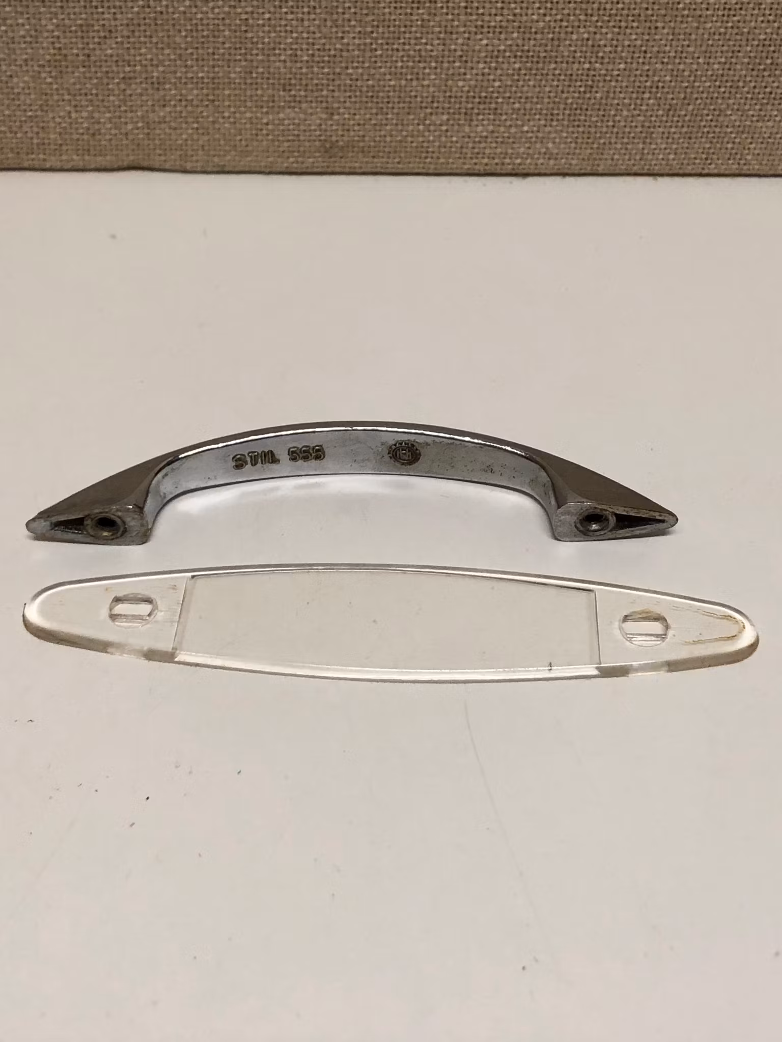 BESLAG, metall/plast, Stil 555, HM, 1900- tredje kvartal.