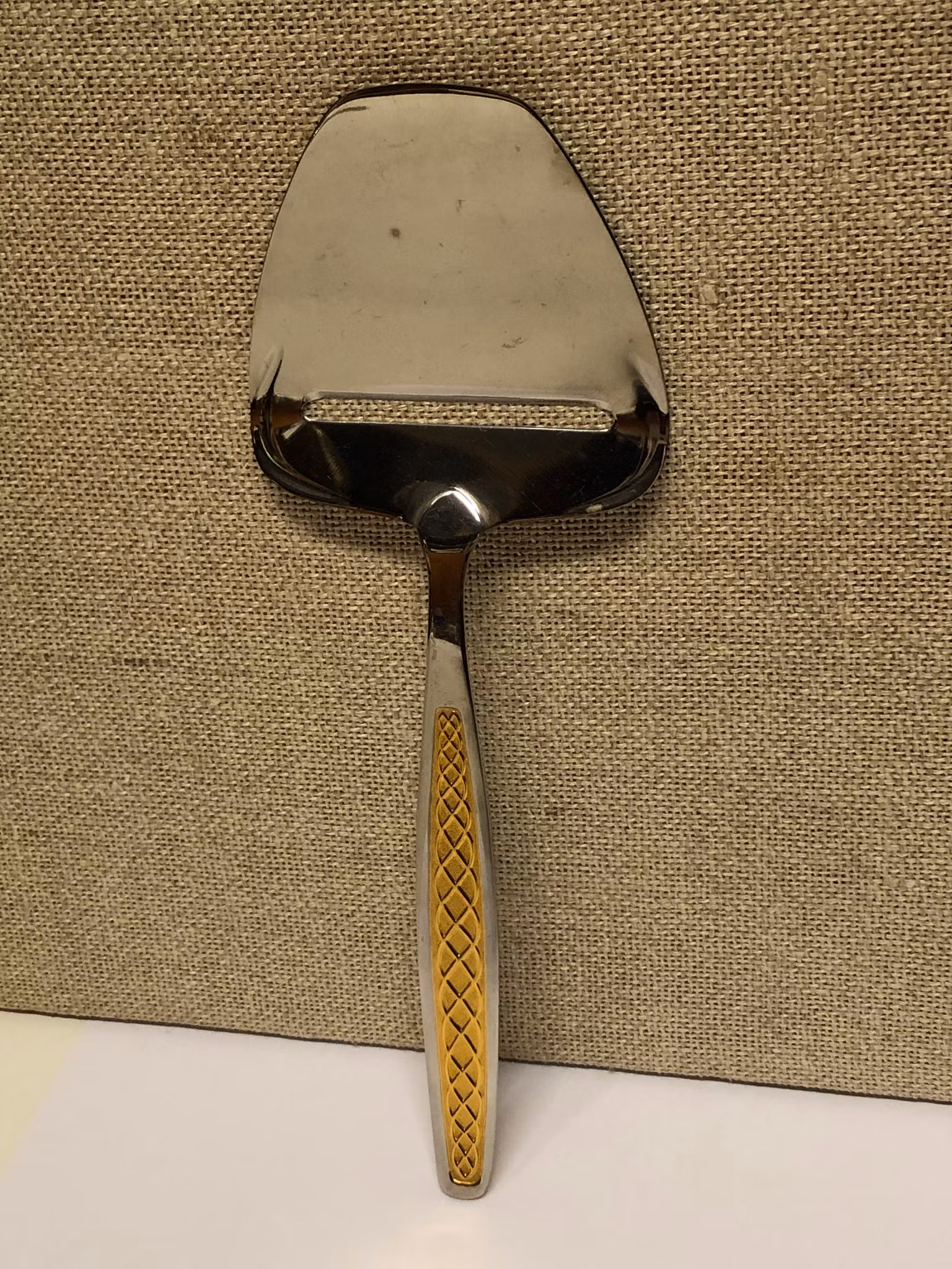 OSTHYVEL, rostfritt, "Guldi", Nils Johan, Sweden.