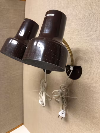 CARL THORE. A pair of wall lamps, metal, Granhaga, 1970s.