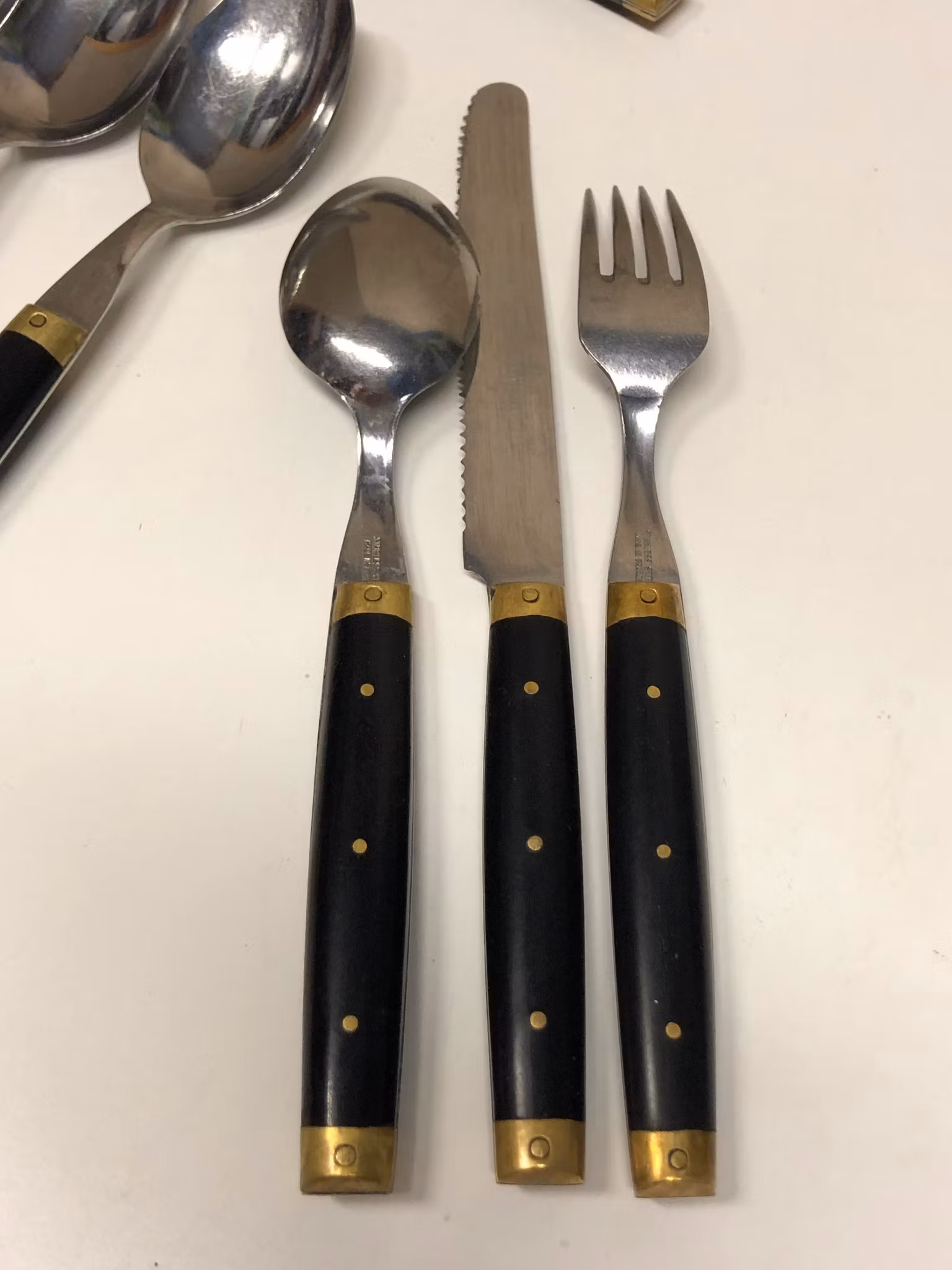 BESTICK 18 delar, rostfritt/mässing/ backelit, ”Melron", France.