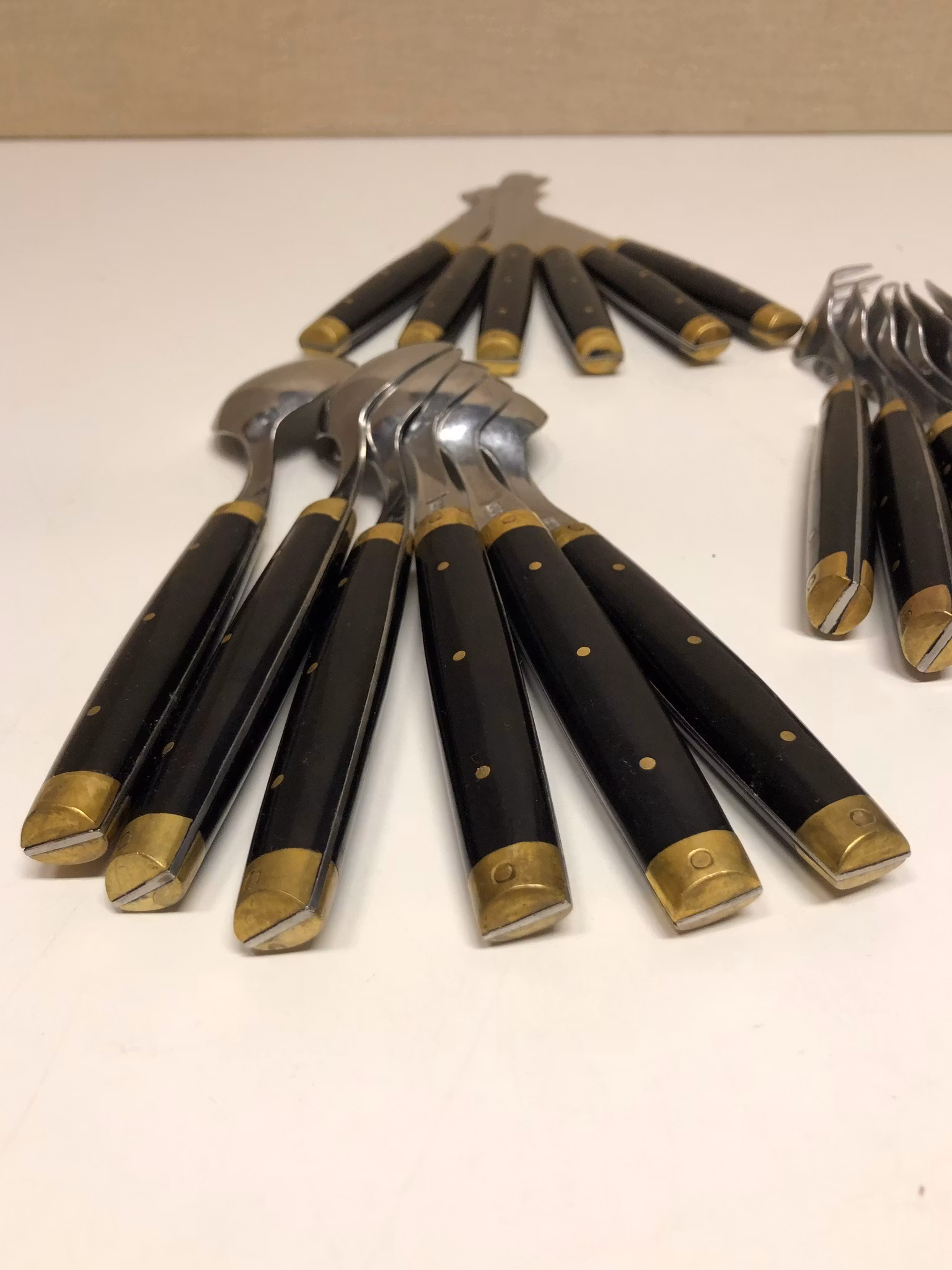 BESTICK 18 delar, rostfritt/mässing/ backelit, ”Melron", France.