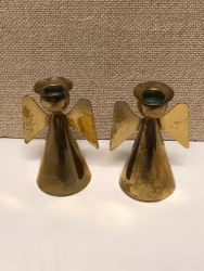 YSTAD METALL, LJUSSTAKAR, ett par, mässing, formad som7 cm. änglar, Sweden, 1900-talets andra hälft.