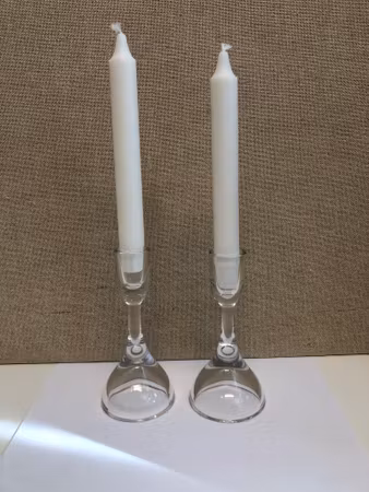 VICKE LINDSTRAND. Candlesticks, a pair, glass, signed, Kosta.