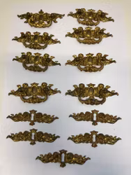 FURNITURE FITTINGS 13 pcs, gilded brass, neo-Renaissance, late 19th century.