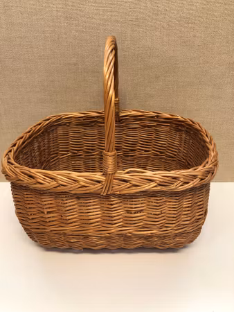 BASKET WITH HANDLE, rattan, second half of the 20th century.