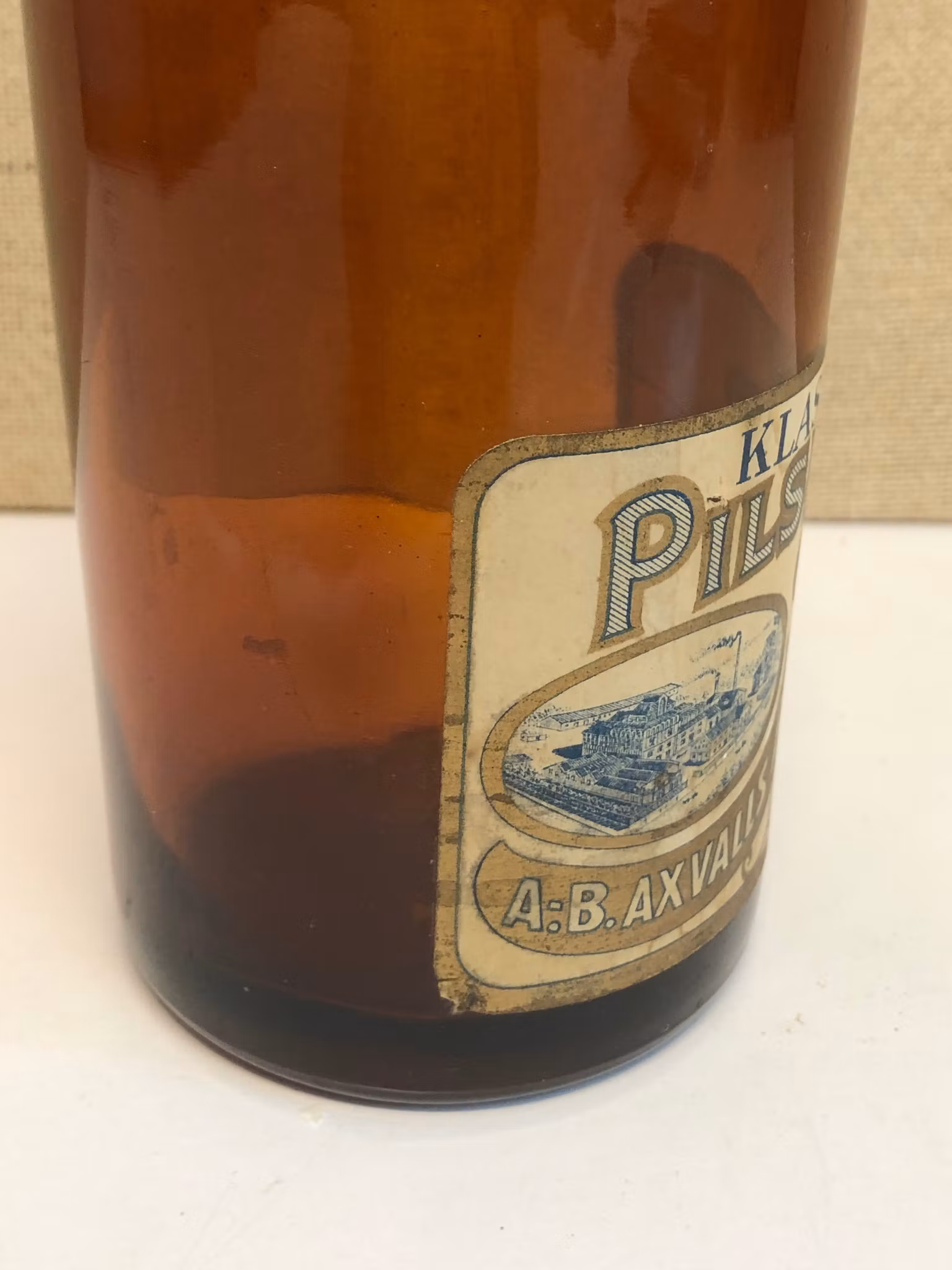 FLASKA, glas, Klass II, Pilsner, A.B. Axvalls Ångbryggeri, 1900-talets första hälft.
