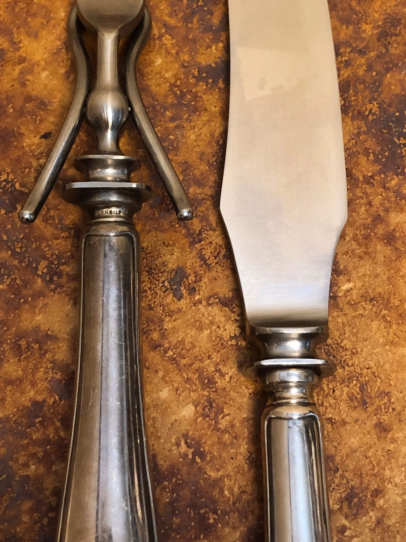 TRANCHERBESTICK 2 delar, nysilver, "Svenska modellen", C.G. Hallberg, 1900-talets första hälft.