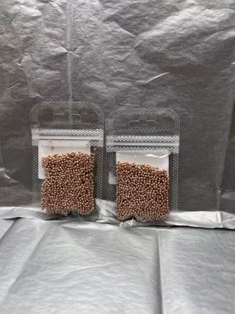 Seed beads i färgen guld