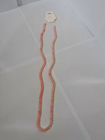 Sträng med glaspärlor i färgen Orang/Rosa färg 6mm (133st)