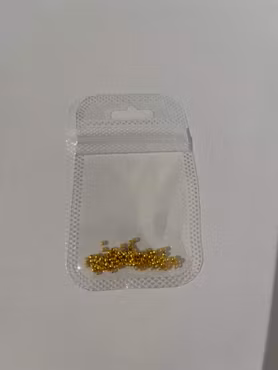 Guldfärgade Klämpärlor