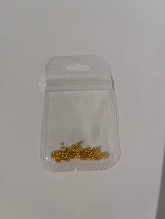 Guldfärgade Klämpärlor