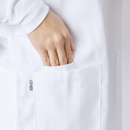 Ärmlös överdragsförkläde med justerbar passform | Exner
