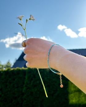 Isblå armbånd