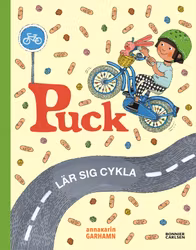 Puck lär sig cykla