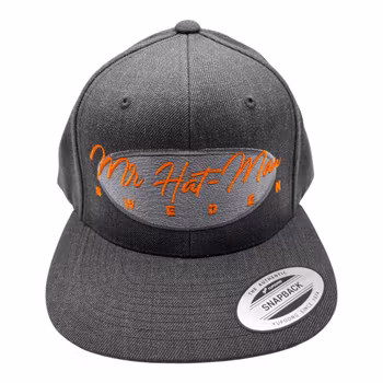 YP6089M SnapBack Dark Grey with a silver front oval and orange text