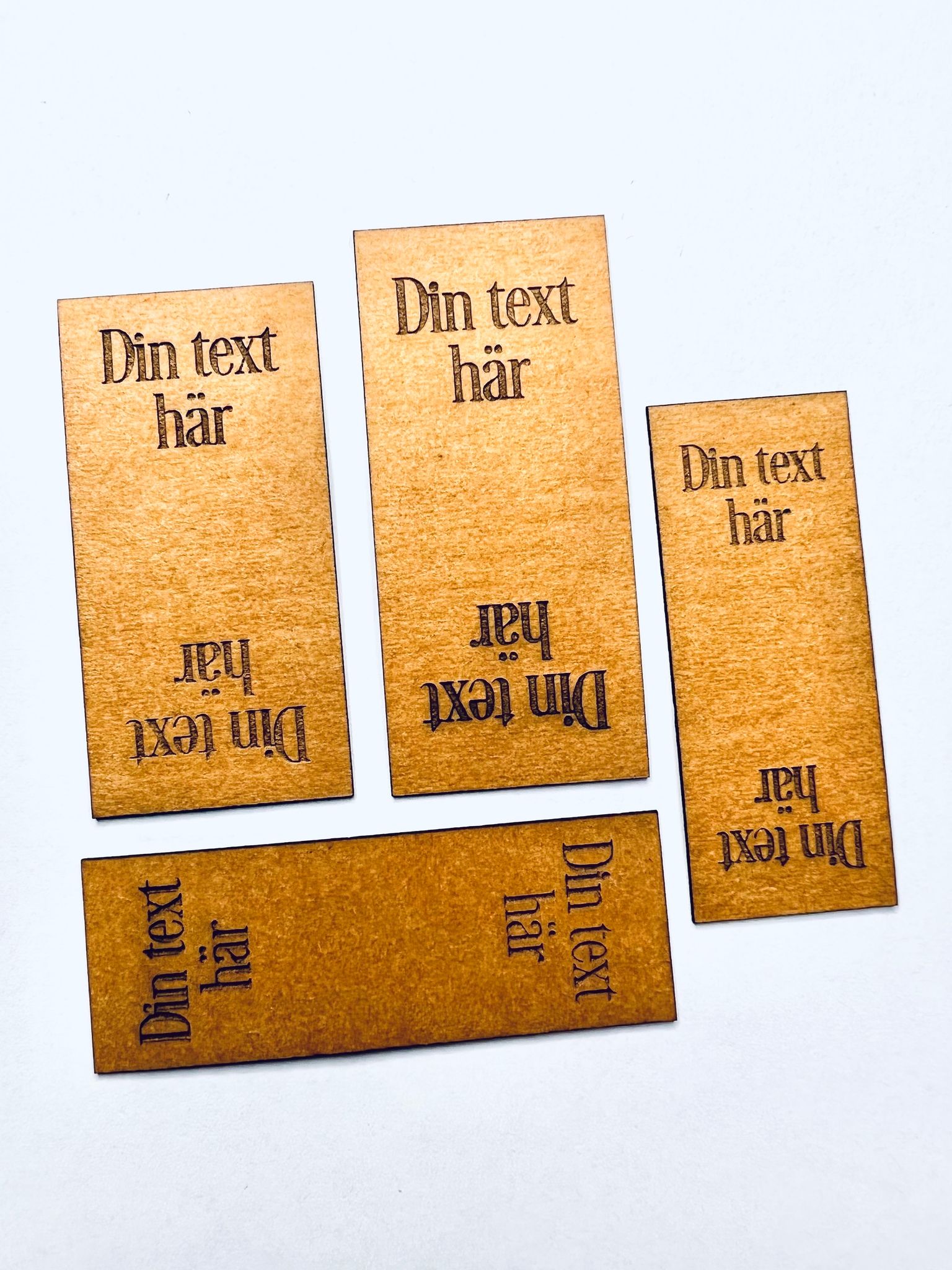 10-pack dubbelvikt etikett i konstläder - egen text