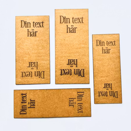 10-pack dubbelvikt etikett i konstläder - egen text
