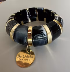 Armband stretch svart/guld