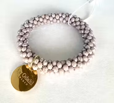 Lila- rosa armband elastiskt