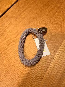 Lila- rosa armband elastiskt