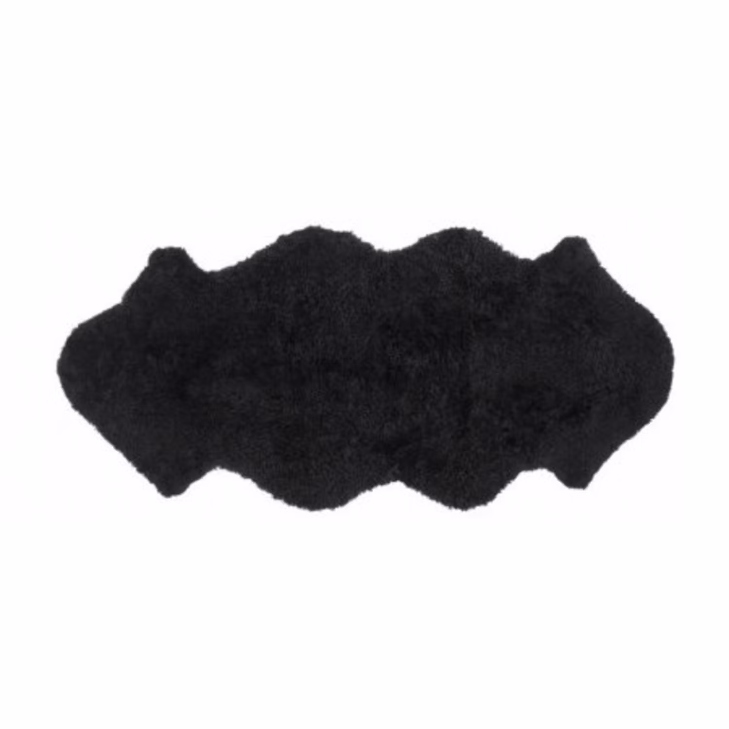 Mjukt fårskinn av längre modell. Hopsytt så att det blir ca 140cm. Djup svart nyans.