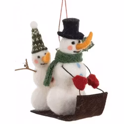 Ulldjur hänge snögubbar på kälke