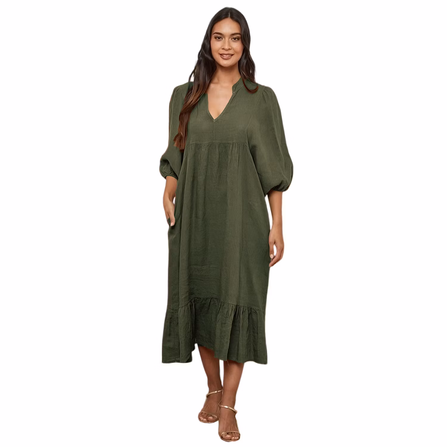 Grön linneklänning med volang och v-ringning. Fin halvlång puffärm och volang nedtill.