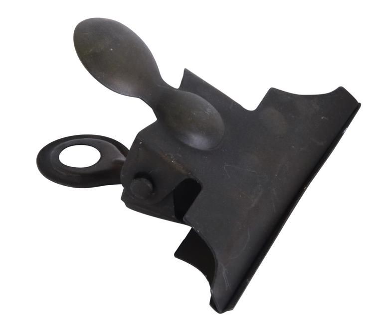 Svart klämma metall