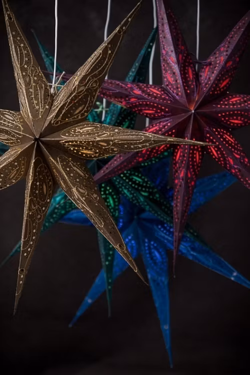 Julstjärna i bronsfärgat papper