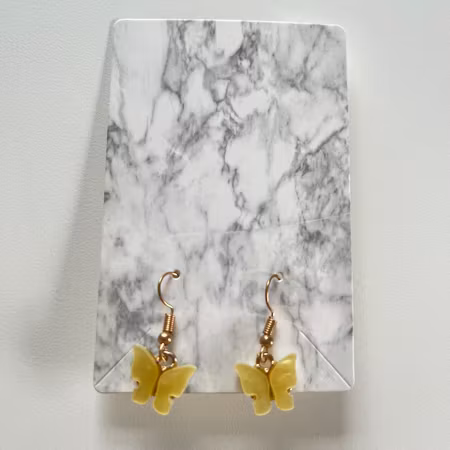 Fjärils örhängen gul