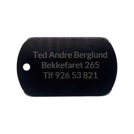 Gravert tag for å merke hunden