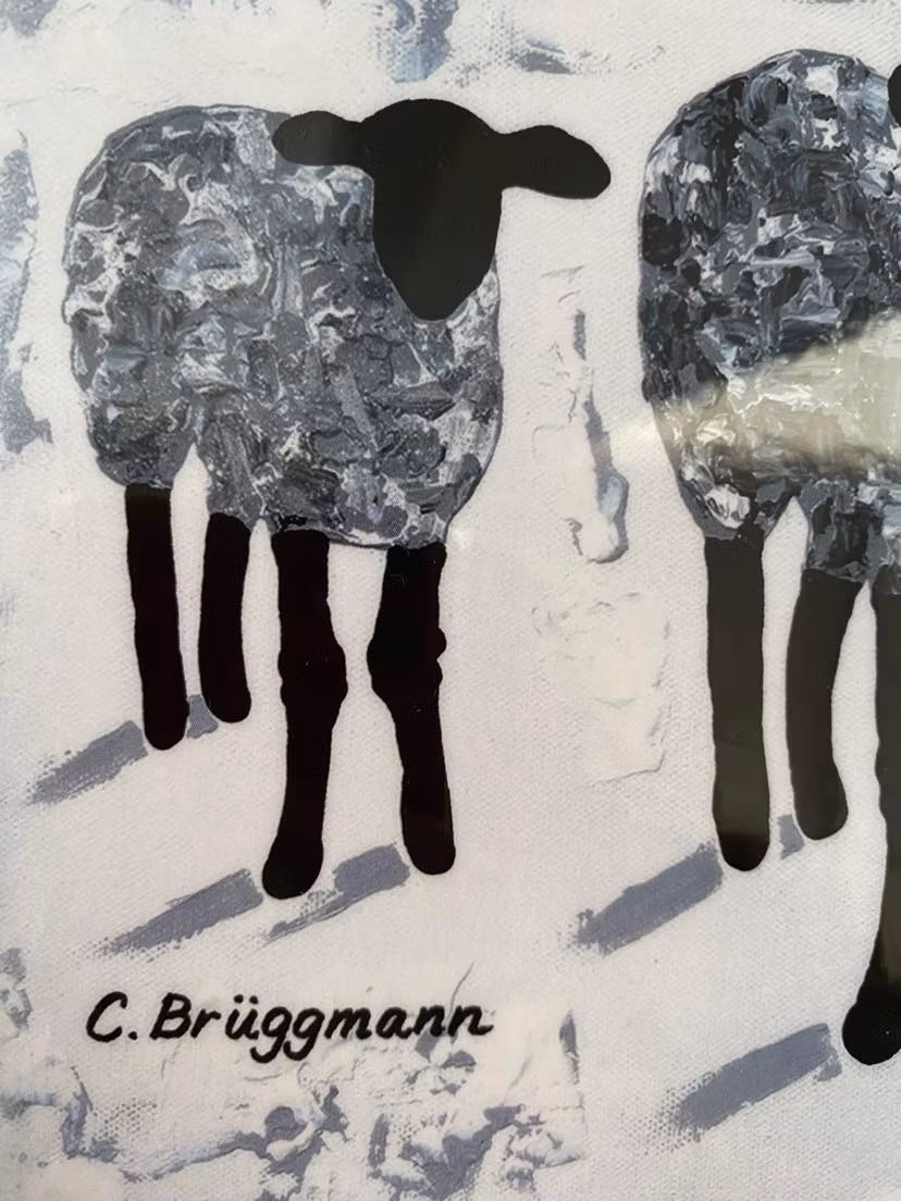 Bordstablett, många grå lamm