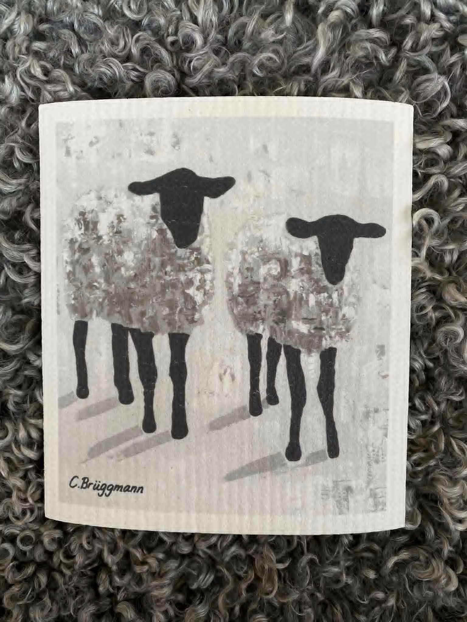Snygg och stilren disktrasa i grått, svart och vitt med fårmotiv målade av C.Brüggmann.