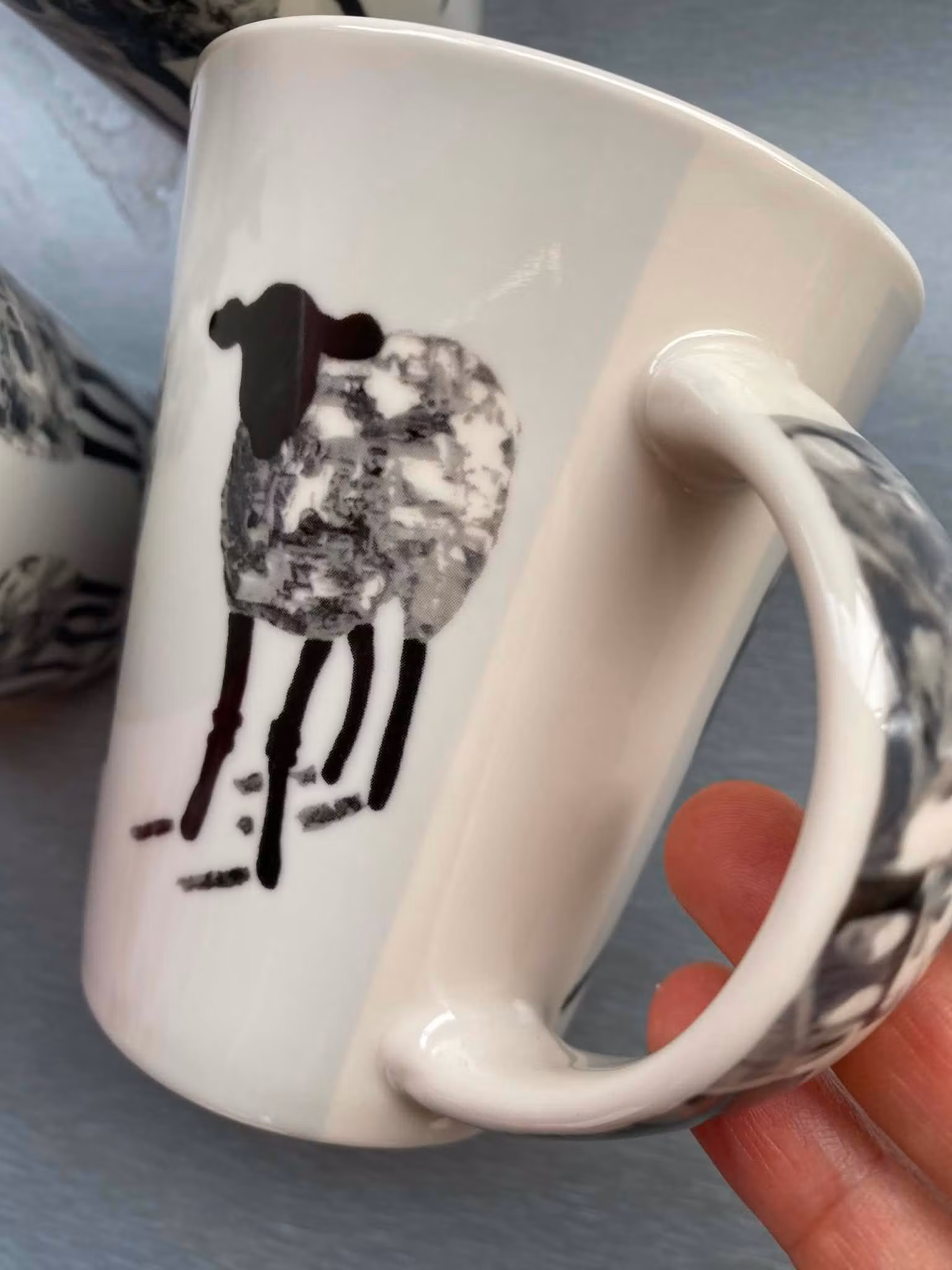 Gotland Fårever är en designserie med fårprodukter såsom denna fårmugg med design av C.Brüggmann.