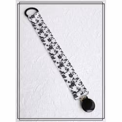 Napphållare vit med svarta blommor