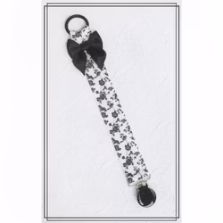 Napphållare vit med svarta blommor och svart rosett