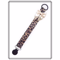 Leopard napphållare med champagnefärgad rosett - svart clip