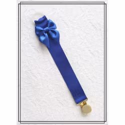 Blå napphållare med rosett - guld