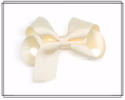 Frida GRÄDDVIT - liten hårrosett